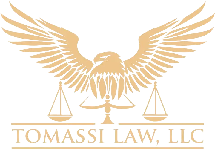 Tomassi Law, LLC logo with golden eagle and scales of justice